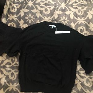 Black sweater with ruffle detail